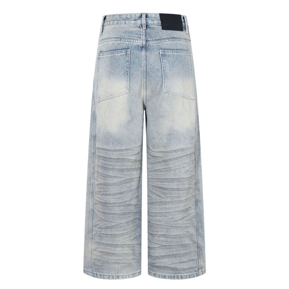 Wrinkled Ripped Light Wash Jeans - Thrashink